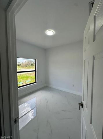 821 Bell BLVD S, Lehigh Acres, FL 33974