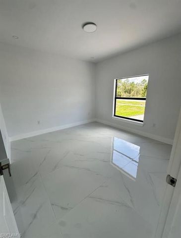 821 Bell BLVD S, Lehigh Acres, FL 33974