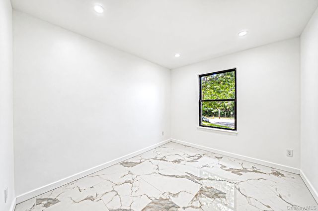 39 Pond Path, Lake Grove, NY 11755
