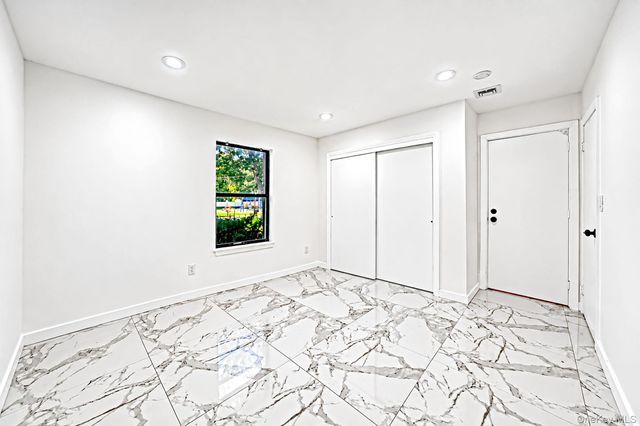 39 Pond Path, Lake Grove, NY 11755