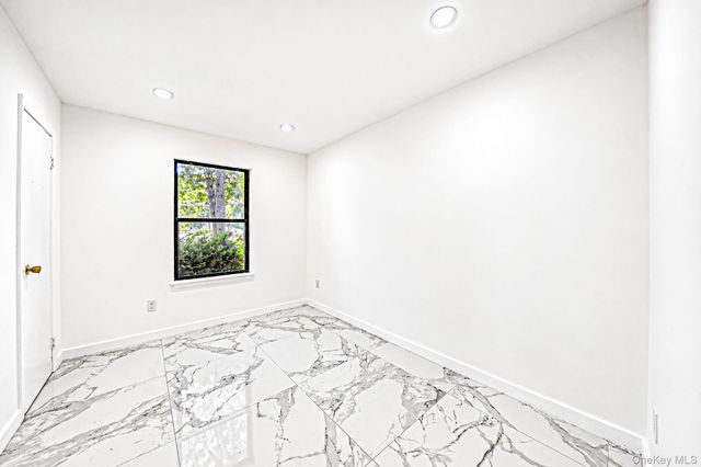 39 Pond Path, Lake Grove, NY 11755