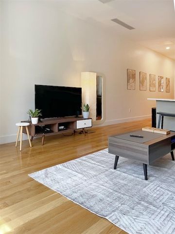 60-11 39 Avenue, Woodside, NY 11377
