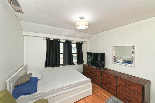 60-11 39 Avenue, Woodside, NY 11377