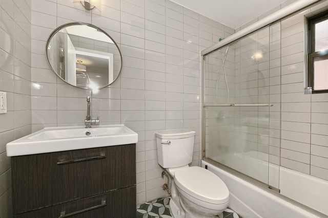 60-11 39 Avenue, Woodside, NY 11377