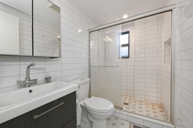 60-11 39 Avenue, Woodside, NY 11377