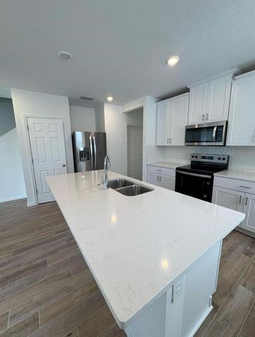 16407 BIRD OF PARADISE AVENUE, Clermont, FL 34714