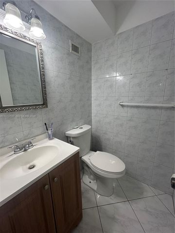 121 Golden Isles Dr 104, Hallandale Beach, FL 33009