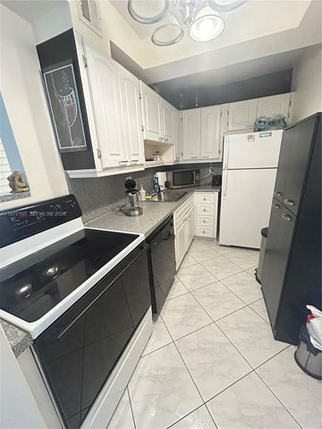 121 Golden Isles Dr 104, Hallandale Beach, FL 33009