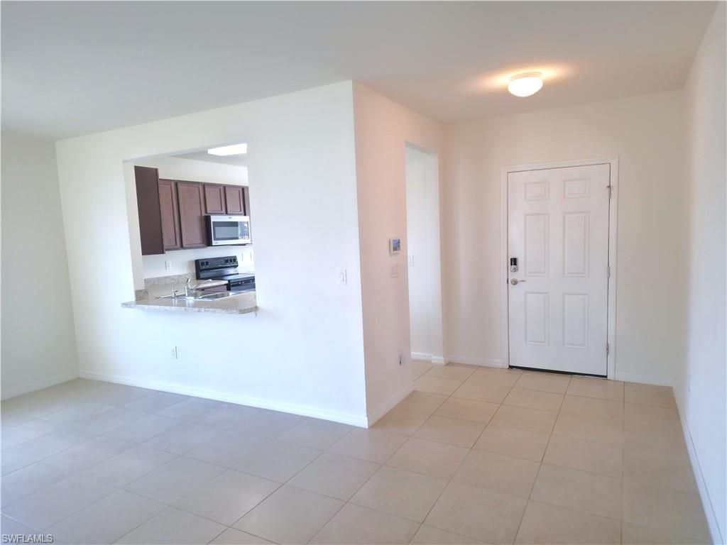 1148 NW 27th CT, CAPE CORAL, FL 33993 — photo 4