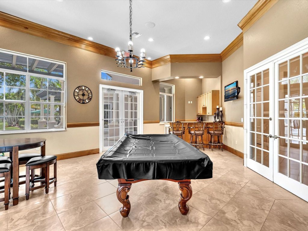 Image 42 of property listing at 10986 NW 62nd Court, Parkland, FL 33076