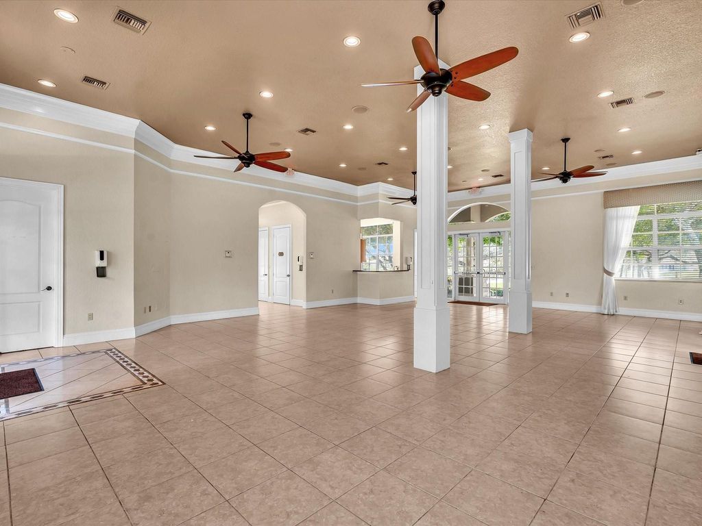 Image 47 of property listing at 10986 NW 62nd Court, Parkland, FL 33076