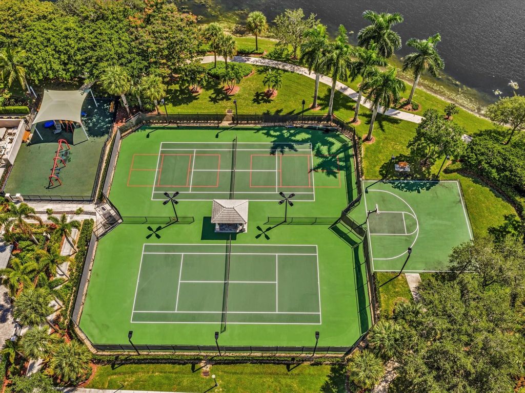 Image 54 of property listing at 10986 NW 62nd Court, Parkland, FL 33076