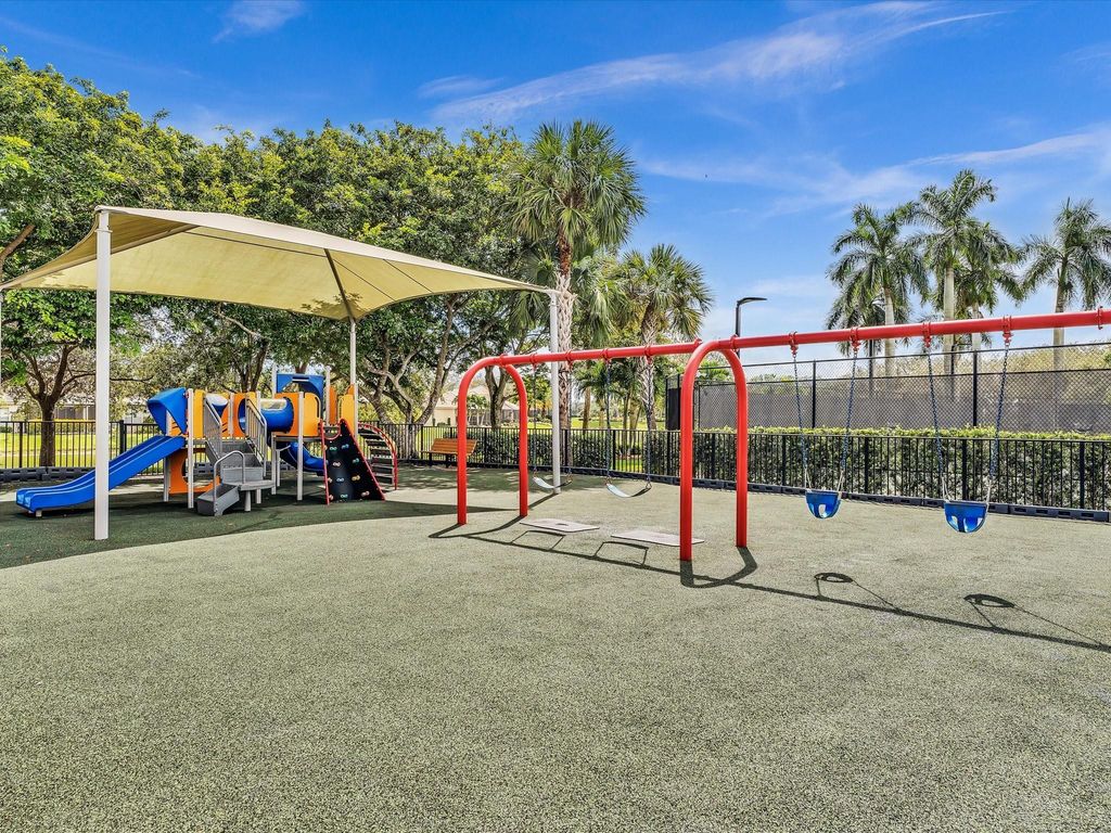 Image 56 of property listing at 10986 NW 62nd Court, Parkland, FL 33076