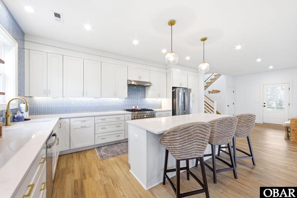 Image 21 of property listing at 22 Osprey Court Lot 22, Manteo, NC 27954