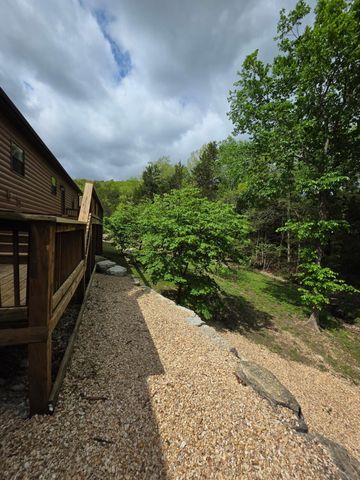 130 Pine Woods Village Drive, Hollister, MO 65672