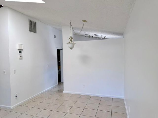 8715 PLUTO Terrace, West Palm Beach, FL 33403