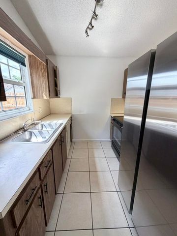 8715 PLUTO Terrace, West Palm Beach, FL 33403