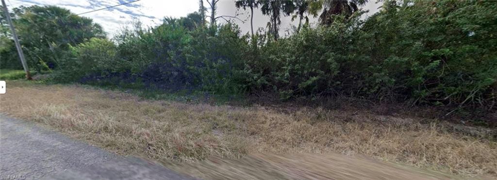 1142 Cumming ST E, LEHIGH ACRES, FL 33974 — exterior