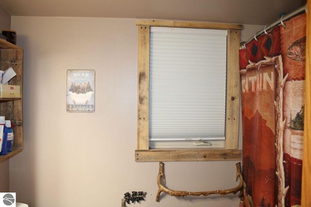 72 NW Wood Road, Rapid City, MI 49676