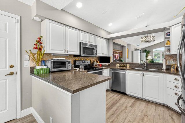 7033 Galleon Cove, Riviera Beach, FL 33418