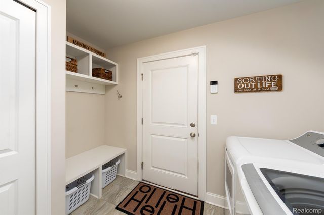 1925 Egret Pointe, Genoa Township, MI 48843