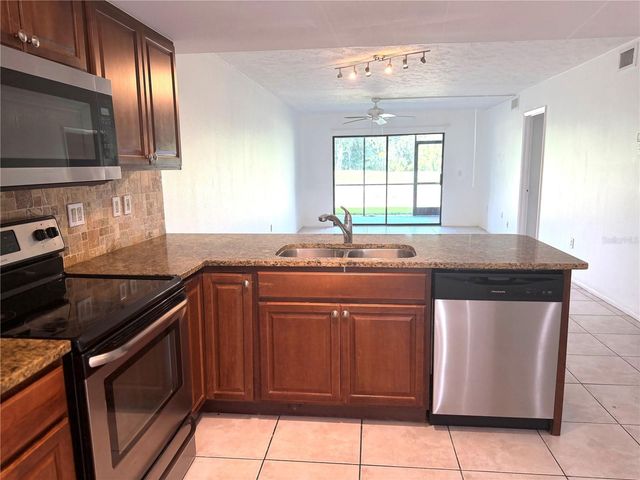 7750 EAGLE CREEK DRIVE 7750, Sarasota, FL 34243