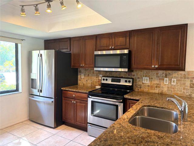 7750 EAGLE CREEK DRIVE 7750, Sarasota, FL 34243