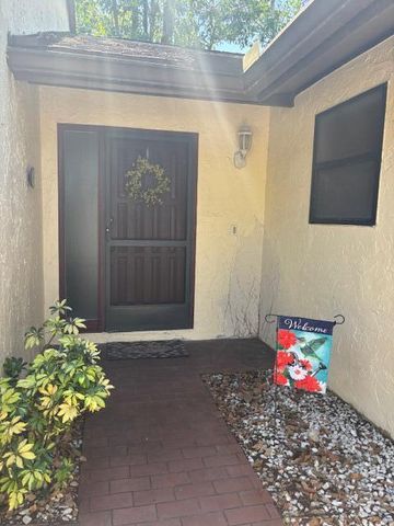 79 Wood Rose Court, Royal Palm Beach, FL 33411