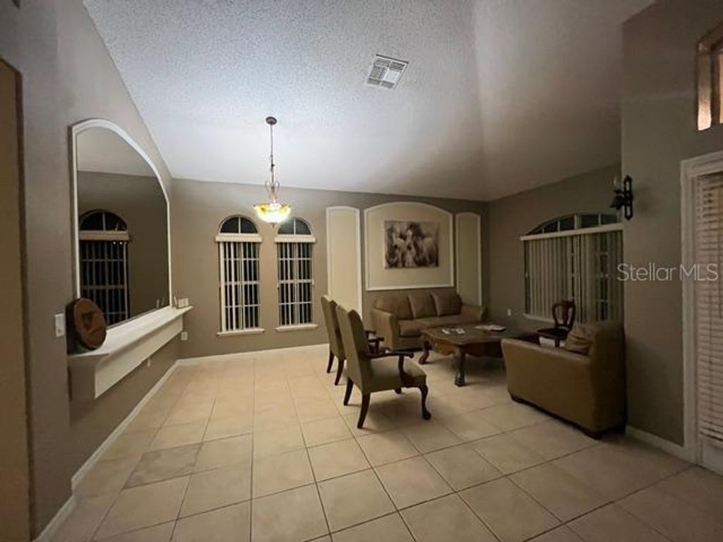 Image 3 of property listing at 2238 WINDCREST LAKE CIRCLE, Orlando, FL 32824