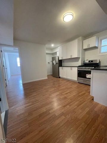 83 4th St, Passaic City, NJ 07055