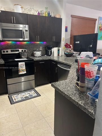 948 NW Phoenix Way, Weston, FL 33327