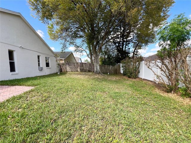 202 WOODBURY PINES CIRCLE, Orlando, FL 32828