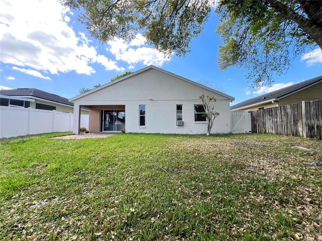 202 WOODBURY PINES CIRCLE, Orlando, FL 32828