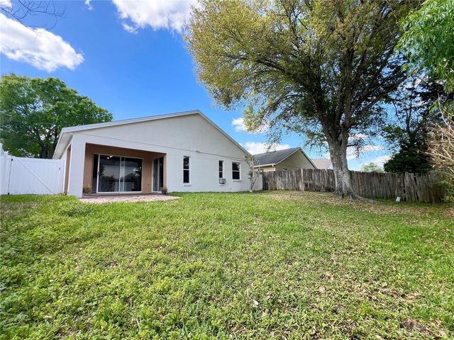 202 WOODBURY PINES CIRCLE, Orlando, FL 32828