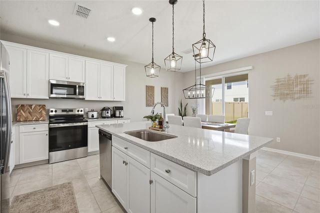 2633 SUNNY PEBBLE LOOP, Zephyrhills, FL 33540