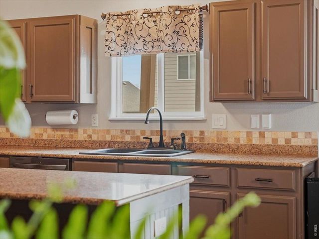 3325 Crazy Horse Dr, Wellington, CO 80549
