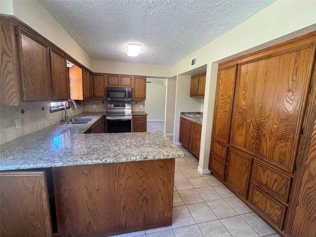 25587 White Oak Lane, Splendora, TX 77372