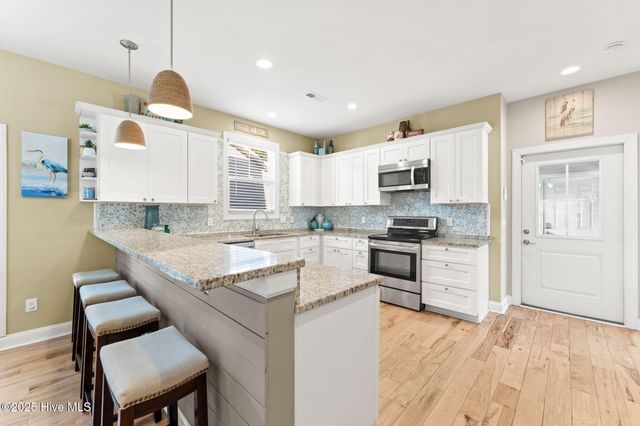 102 NE 63rd Street, Oak Island, NC 28465