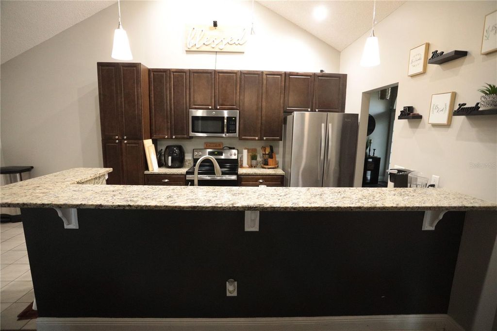 Image 11 of property listing at 6766 KNIGHTSWOOD DRIVE, Orlando, FL 32818