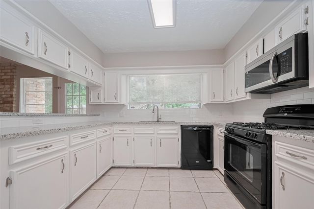 2606 Lexington Woods Drive, Spring, TX 77373