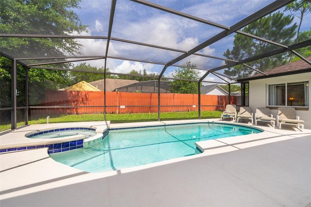 215 PARADISE WOODS PLACE, Davenport, FL 33896
