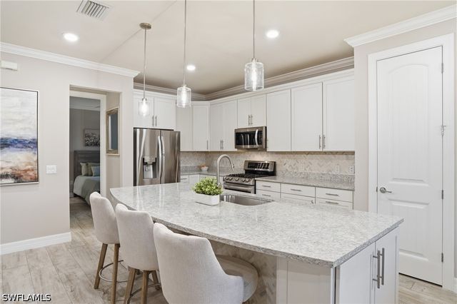 7195 Wilton DR, Naples, FL 34109