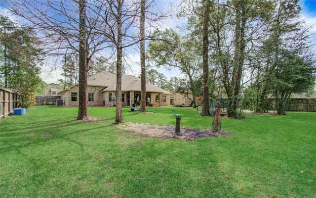 1003 Garrett Drive, Magnolia, TX 77354