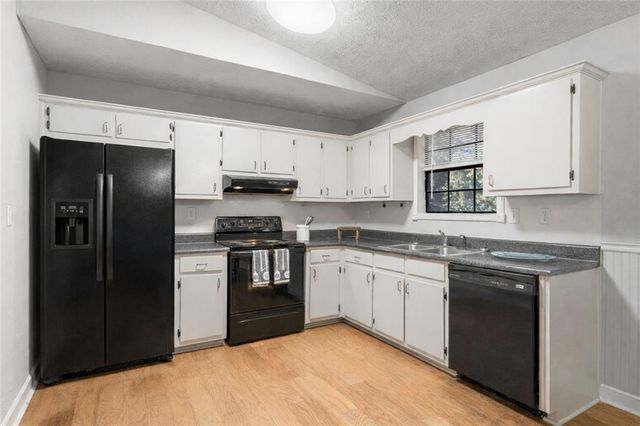 1141 Holly Hills Drive SW, Lilburn, GA 30047