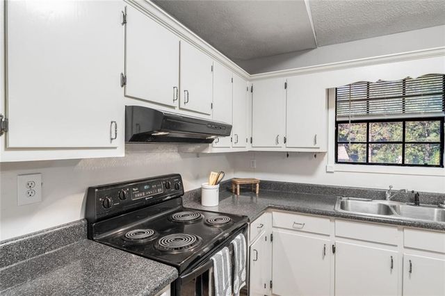 1141 Holly Hills Drive SW, Lilburn, GA 30047