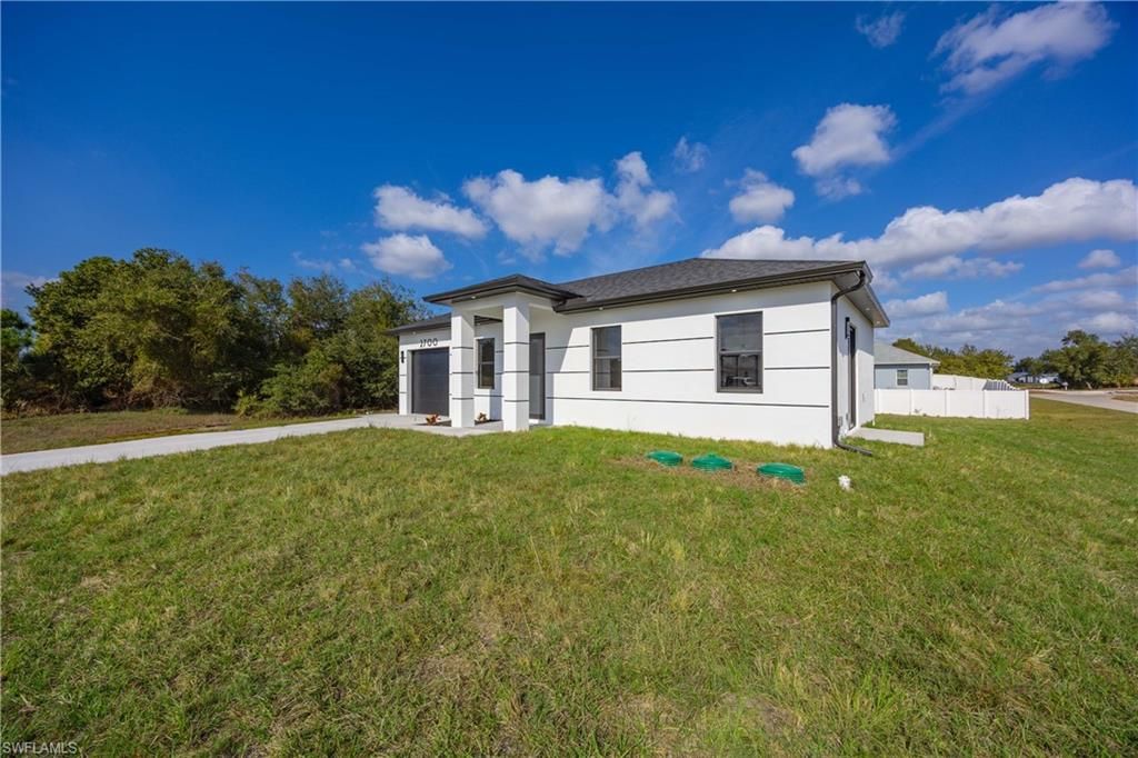 2700 49th ST SW, LEHIGH ACRES, FL 33976 — photo 2