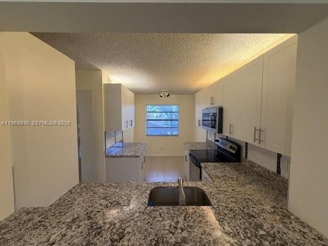 2071 Coral Ridge Dr N204, Coral Springs, FL 33071