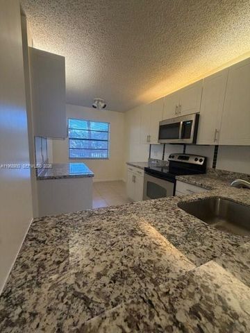 2071 Coral Ridge Dr N204, Coral Springs, FL 33071