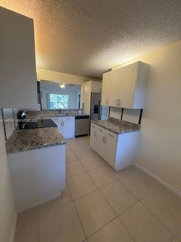 2071 Coral Ridge Dr N204, Coral Springs, FL 33071