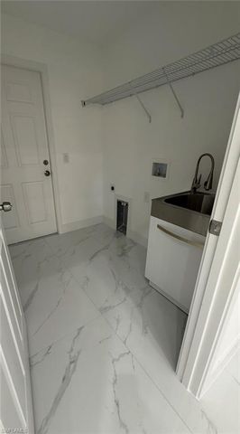 704 Cortez AVE, Lehigh Acres, FL 33972